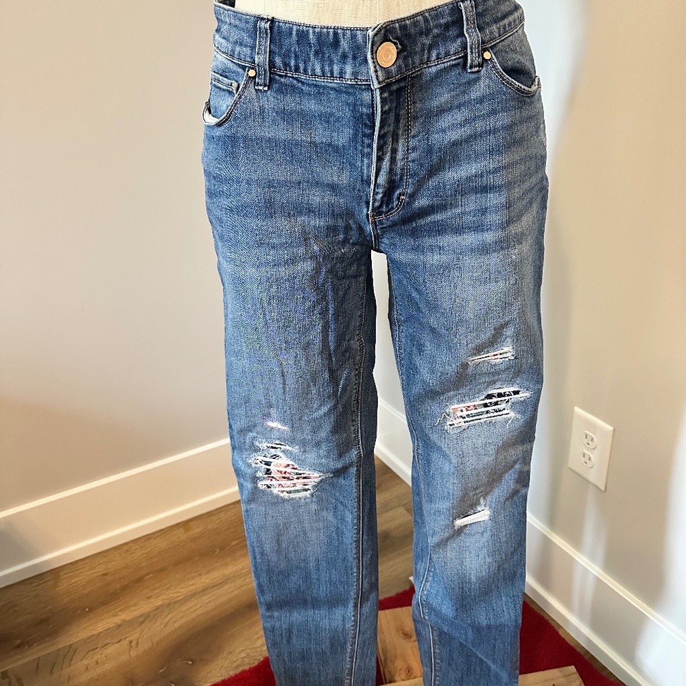 WHBM jeans with floral patches